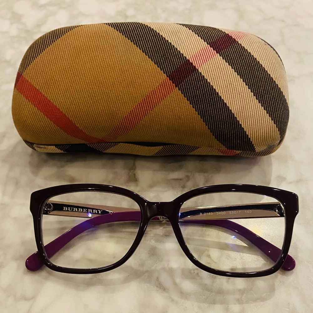 Burberry glasses with blue anti reflective lenses with the Burberry cases